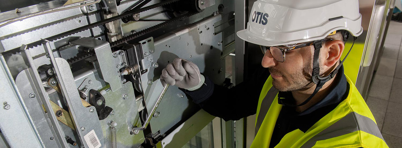 Otis technician working in the field