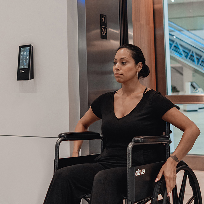 lady leaving elevator